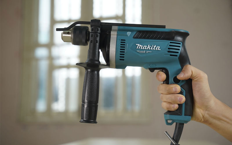 Máy khoan búa Makita M8100KX2B (26 phụ kiện)