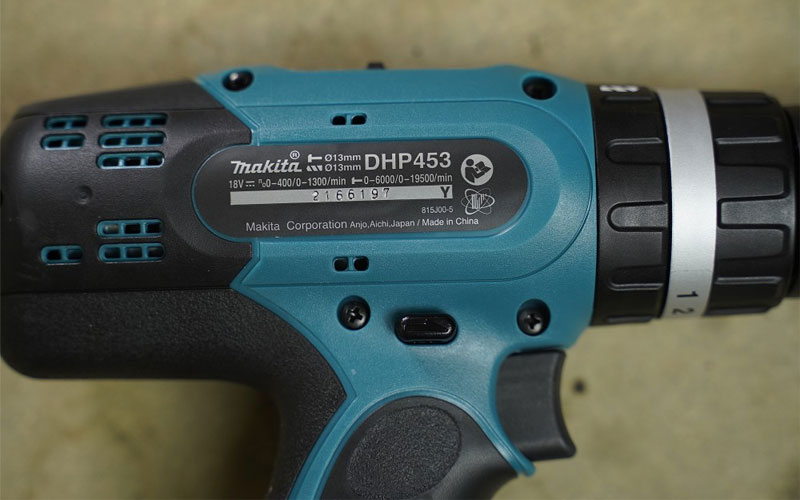 Máy khoan búa và vặn vít pin Makita DHP453SFX8