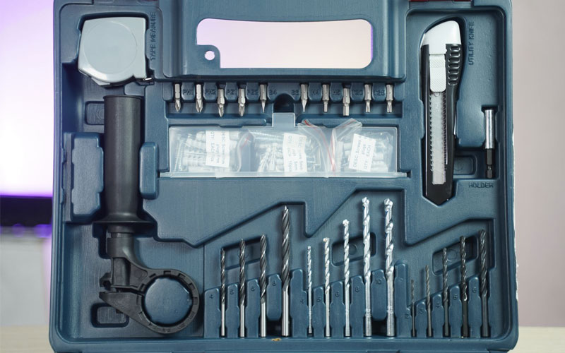 Máy khoan động lực Bosch GSB 13RE (bộ set có valy 100 món phụ kiện)