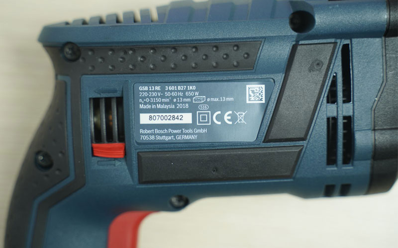 Máy khoan động lực Bosch GSB 13RE (bộ set có valy 100 món phụ kiện)