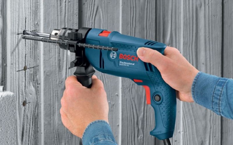 Máy khoan động lực Bosch GSB 550 (bộ set valy 100 món phụ kiện)