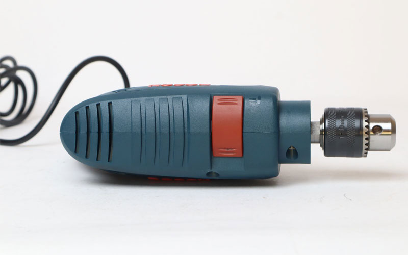 Máy khoan động lực Bosch GSB 10RE (valy nhựa, bộ mũi khoan + đầu vít)
